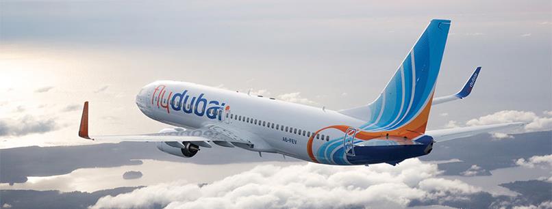 Airplane-in-the-air-over-clouds-972x370